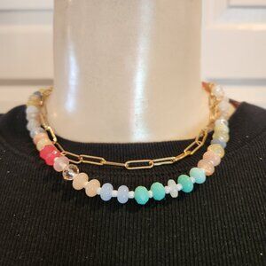 Strand necklace featuring a gold-plated paperclip chain